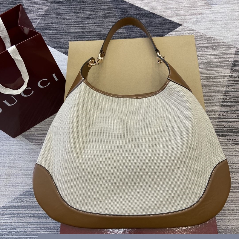 G*u*i top handle bags